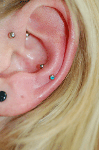 let's do a couple more piercings on this ear