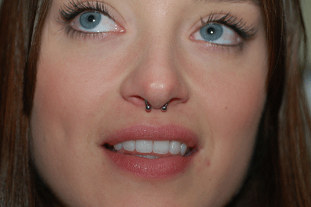 She's pierced and she knows it!